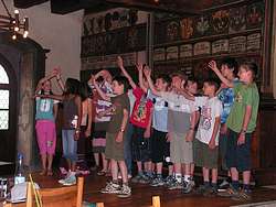 Kids rehearsing in the Knights' Hall