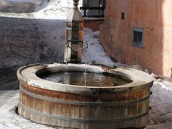 Old wooden fountain in Guarda